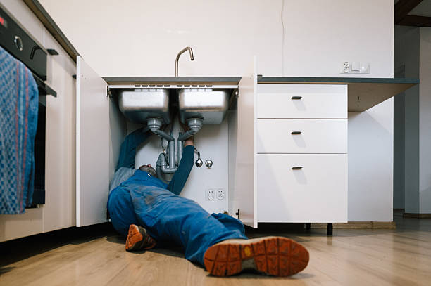 Professional Emergency Plumber technician working in Purchase, NY